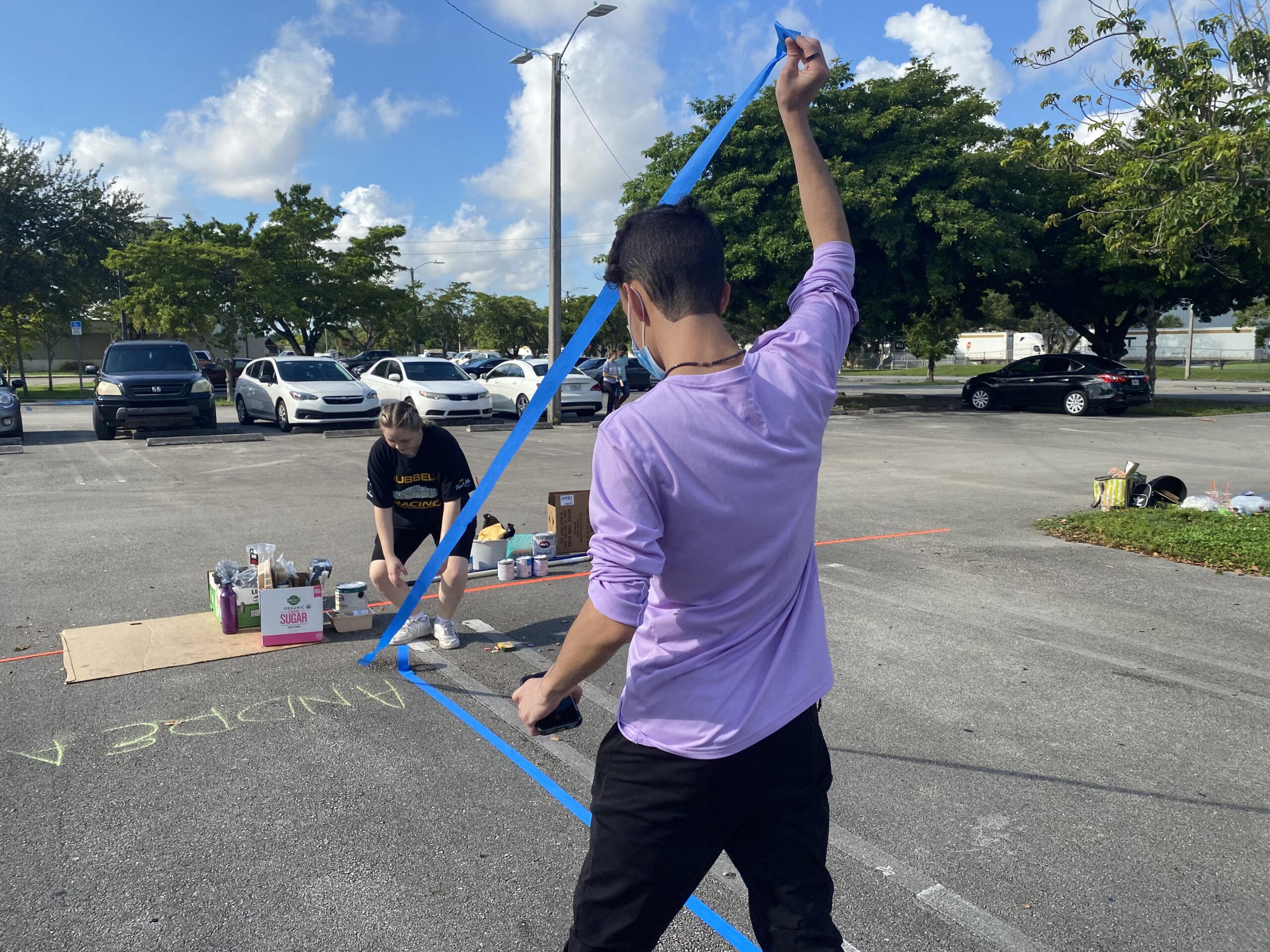 Senior Parking Lot Painting, MLEC Senior Activities Begin